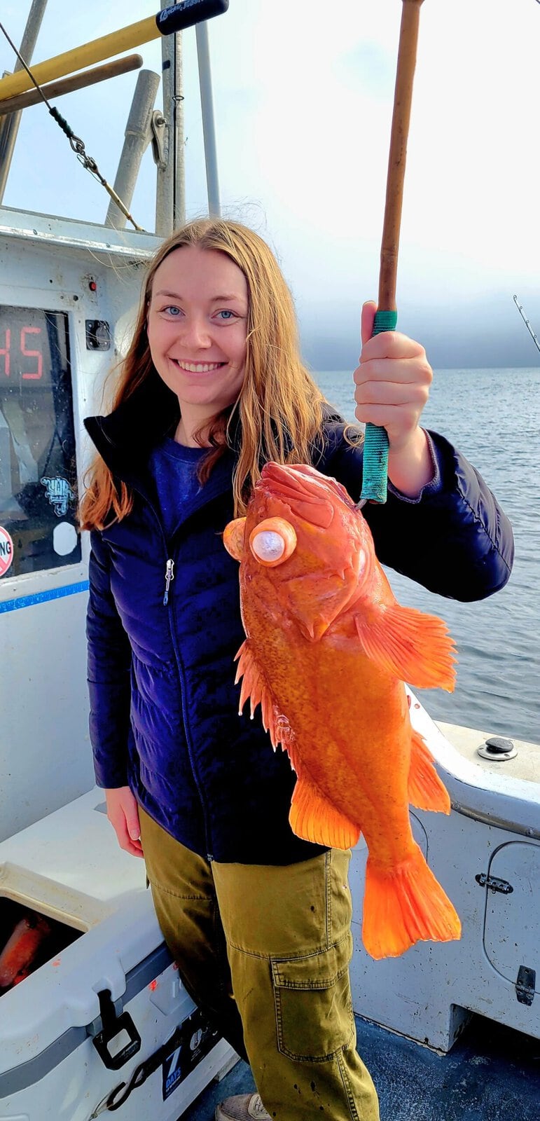 Happy angler with a large fish